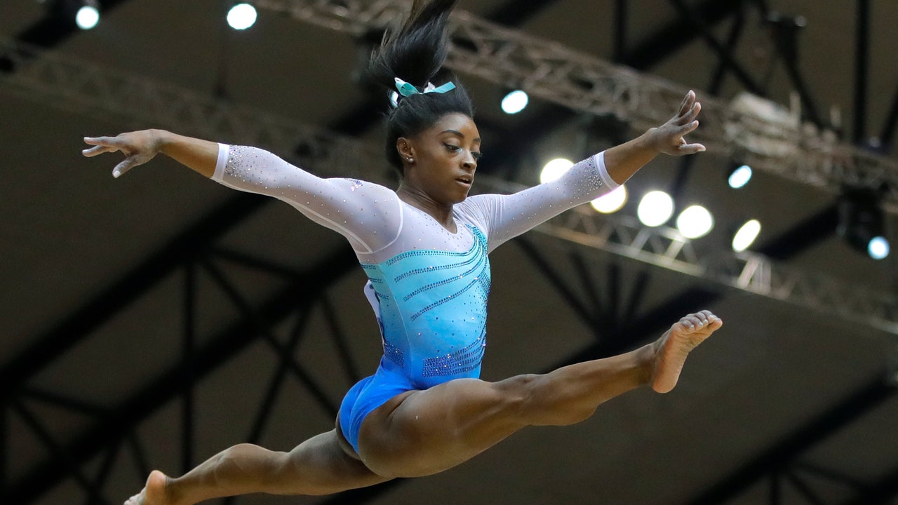Biles wins 4th all-around title at worlds despite mistakes